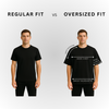 Comparison of regular fit and oversized fit black t-shirts on a gray background